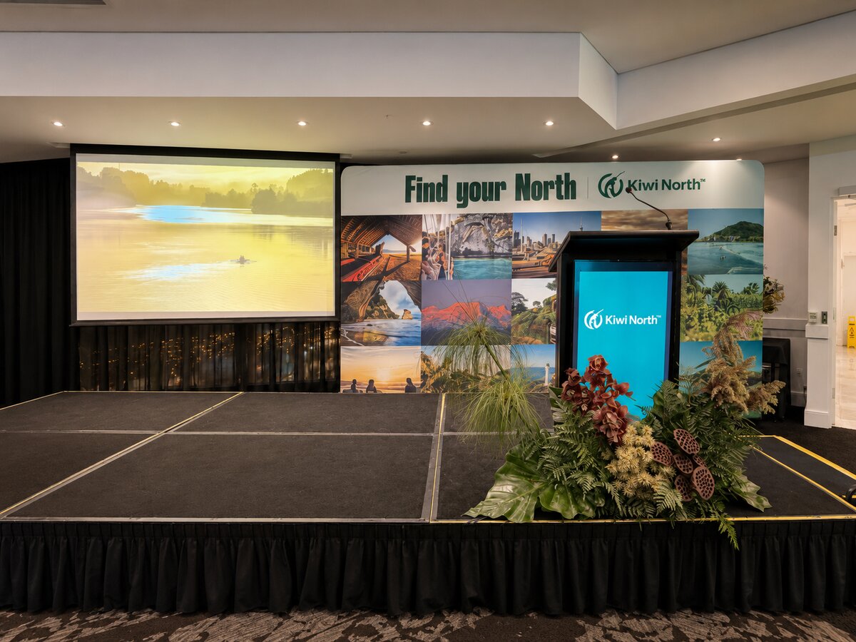 Kiwi North branding on stage